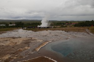 View of Strokkur geyser erupting from Geysir