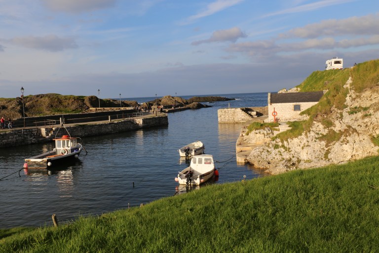 This is Ballintoy Harbor, which stands in for Pyke and Saltpans. Theon and Arya both used this set, but for different places, even though the only differences were the actor and weather. 