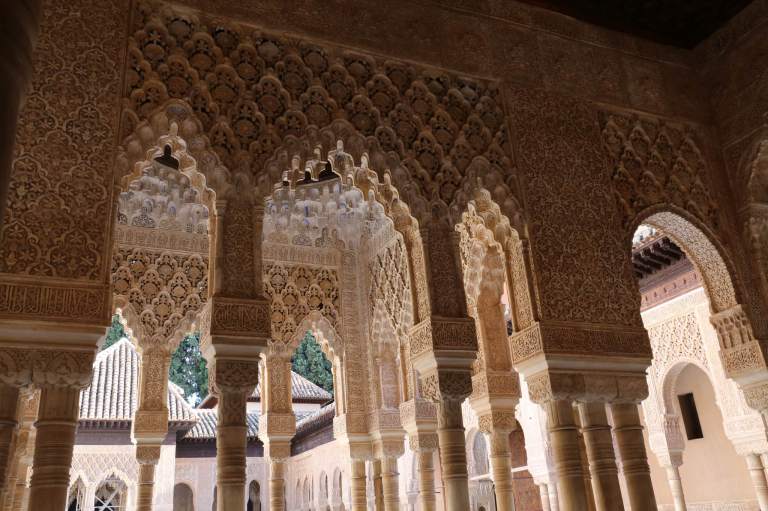Arches on the outer edge of the Court of Lions