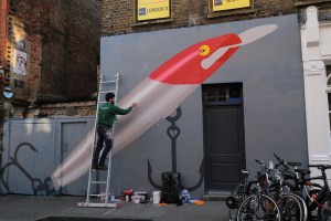 This artist from Spain is working on his mural on Hanbury St.