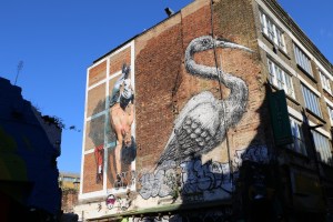 The crane is a ROA. The man on the left has taken off his Queens Guard uniform - you can see the jacket hanging beside him. 