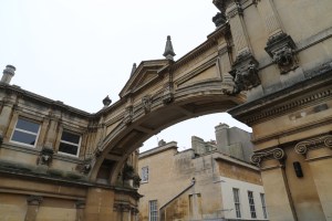 An arch connecting two buildings, near the Roman Baths