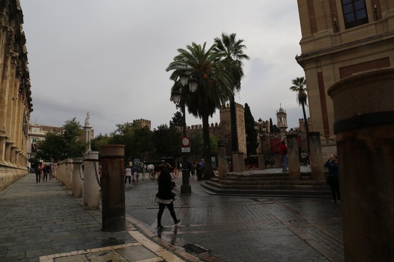 The main square in Old Town, next to the Cathedral, India Archives and Alcazar Palace.
