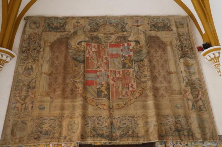 Charles V's crest, added in time for his wedding to Isabella of Portugal