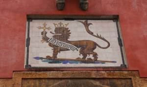 This lion crest adorns the top of the Door of the Lion, earning the door its name
