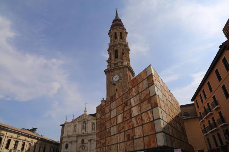 The Cathedral of Salvador is just across the square from the Basilica. The cube in front is part of a museum.