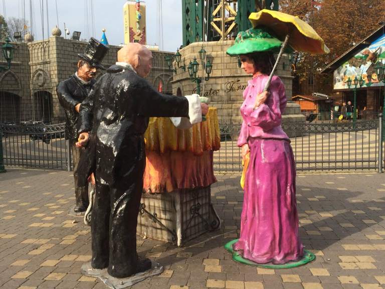 From a distance, these statues look like real people standing there, especially after dark.